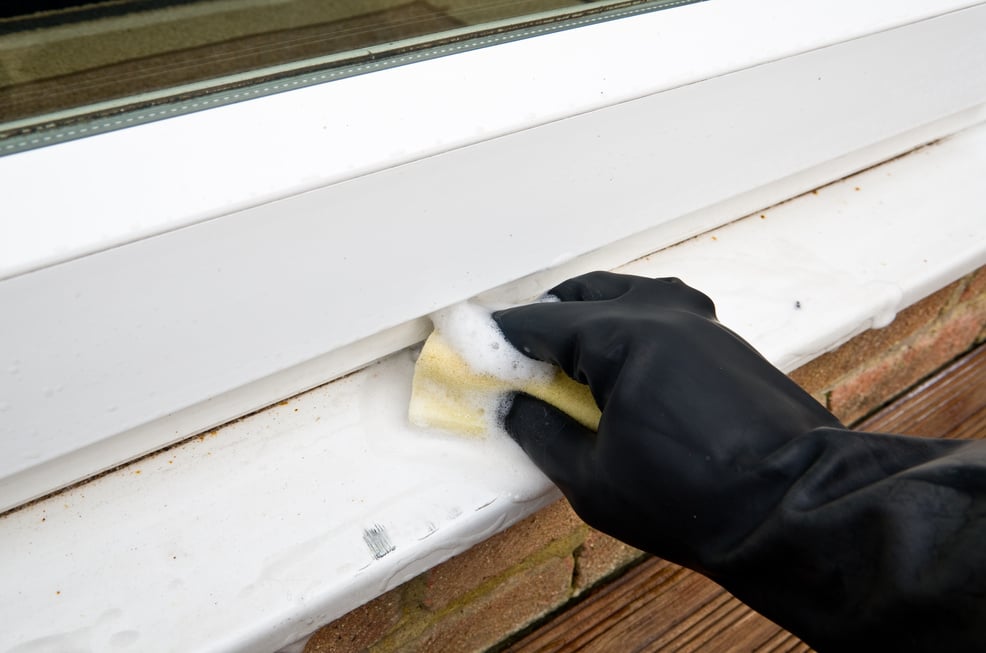 Cleaning uPVC door sills on frame